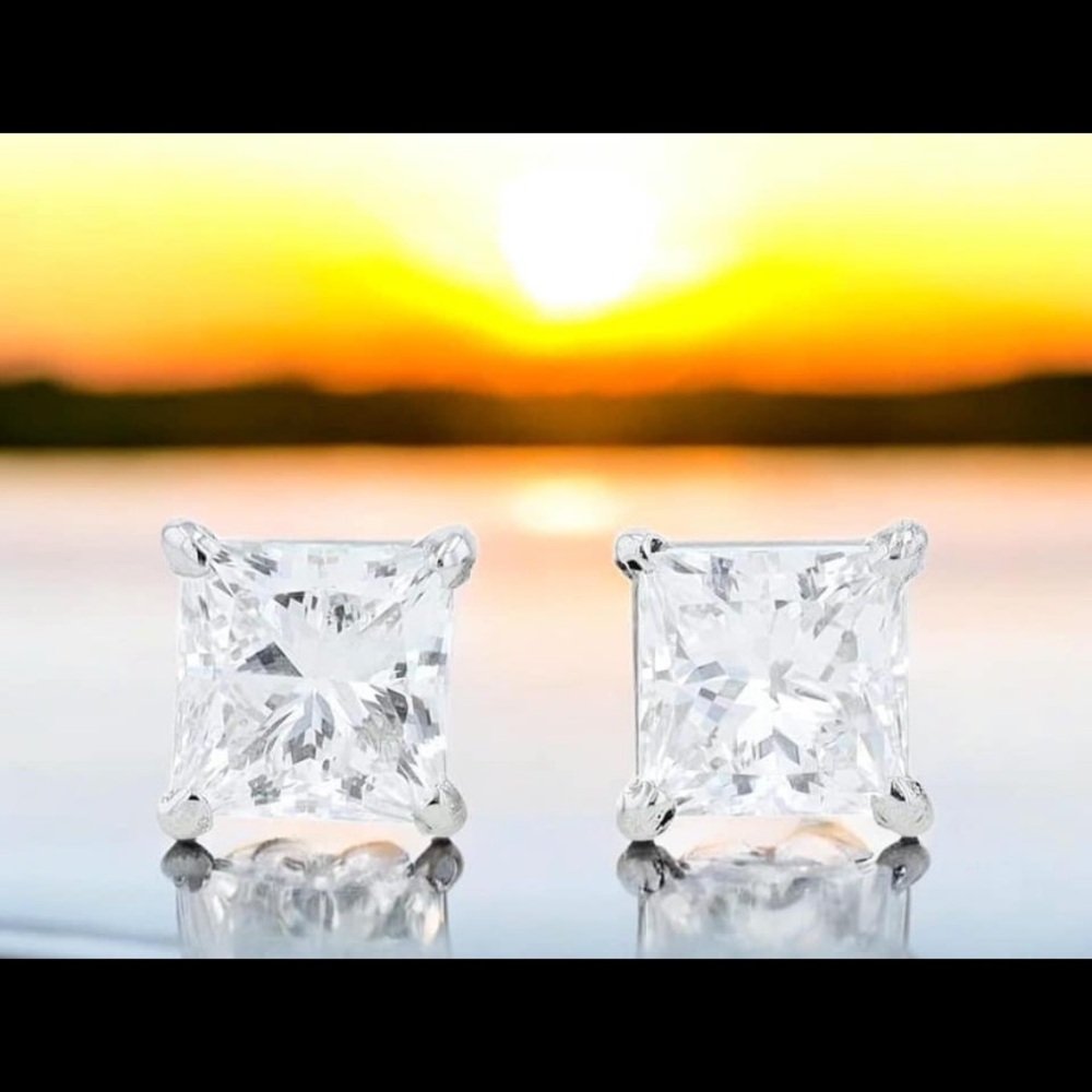 2 carat princess cut moissanite studs set in sterling silver, with screw backs.